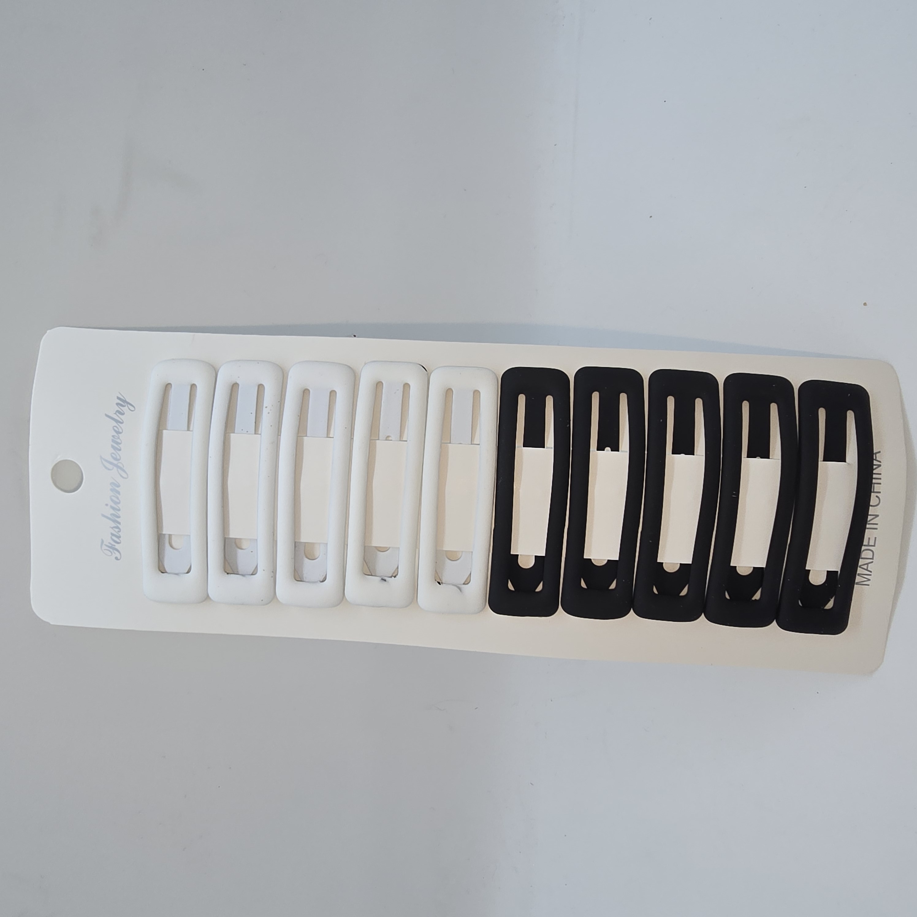 HEBILLAS PARA EL CABELLO EN BLANCO Y NEGRO X 10 UNIDADES - ZJ222106
